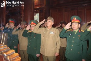 Young officers from Cuban Ministry of Revolutionary Armed Forces offer incense to commemorate President Ho Chi Minh