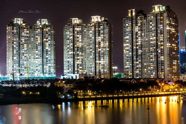The city sparkling with the lights from skyscrapers and new residential areas