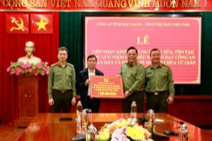 Hanoi Public Security helps Bac Giang's town embellish memorial area of Uncle Ho