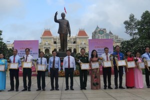 Ho Chi Minh city's district honors typical examples following Uncle Ho