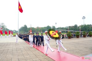 Vietnam Coast Guard report achievement to President Ho Chi Minh at his mausoleum