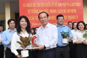HCMC honors seven individuals telling stories under flag about studying and following Uncle Ho